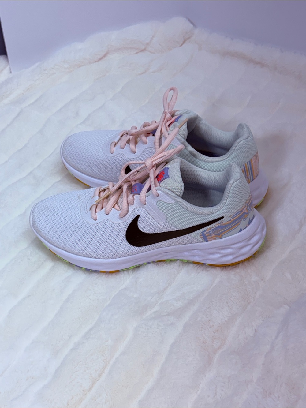 Nike White ladies 6.5 - Running Shoes with Black Swoosh and Pastel Accents